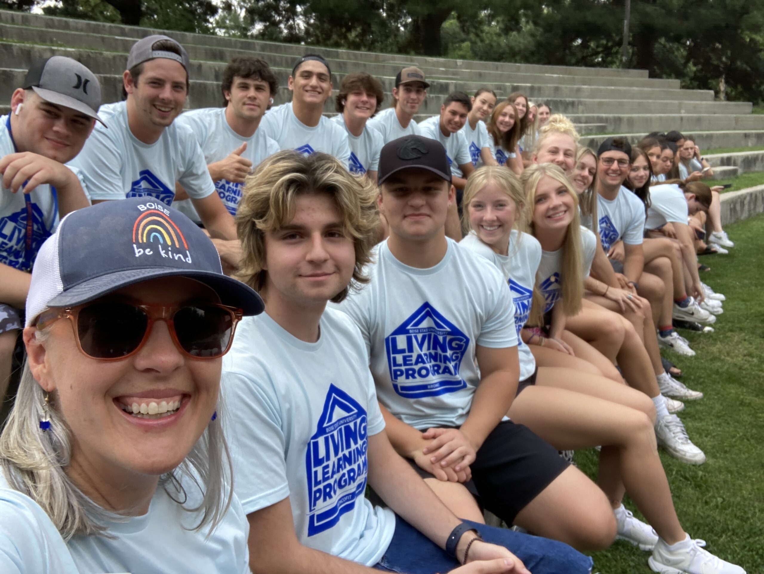 BroncoFit Living Learning Community students pose with Faculty in Residence Kristin Olson as she takes a selfie at the amphitheater
