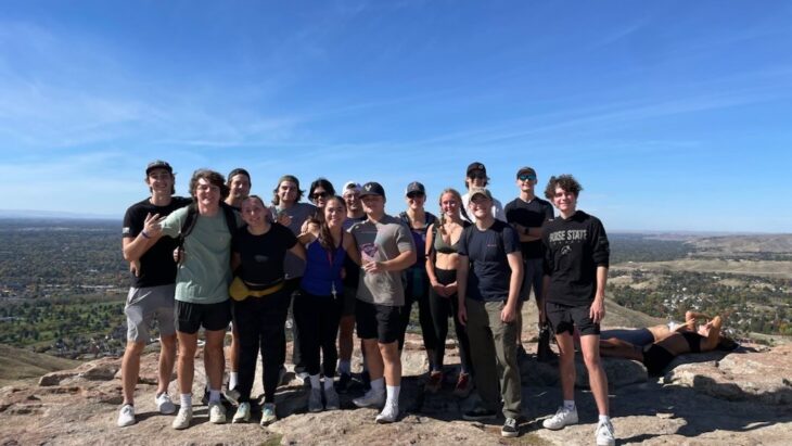 BroncoFit Living Learning Communities on top of Table Rock after a hike.