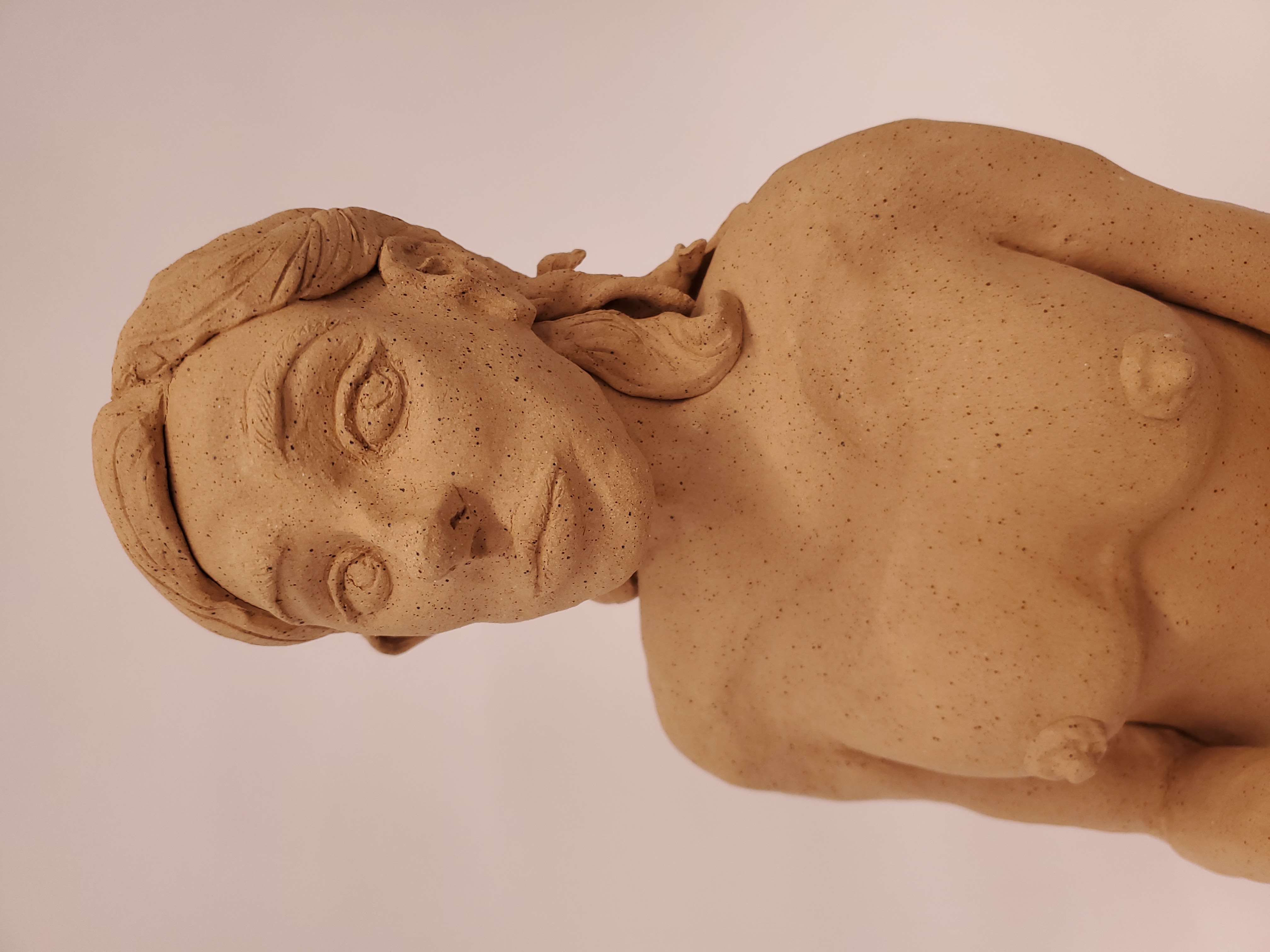 Offering, ceramic female sculpture.