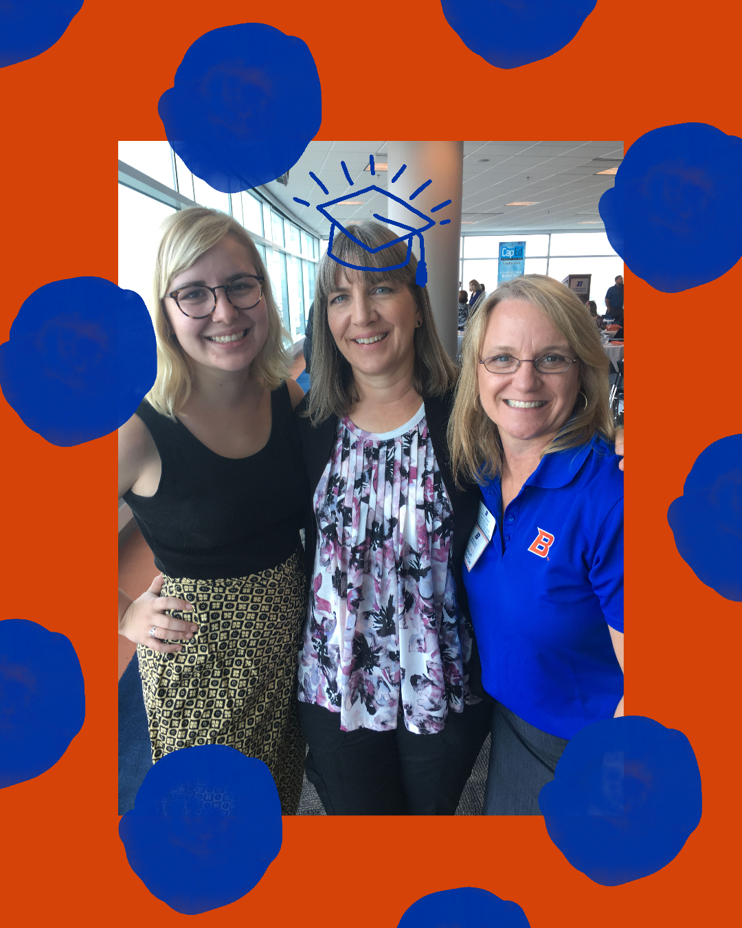 Kati Searles poses with her academic advisor and her daughter