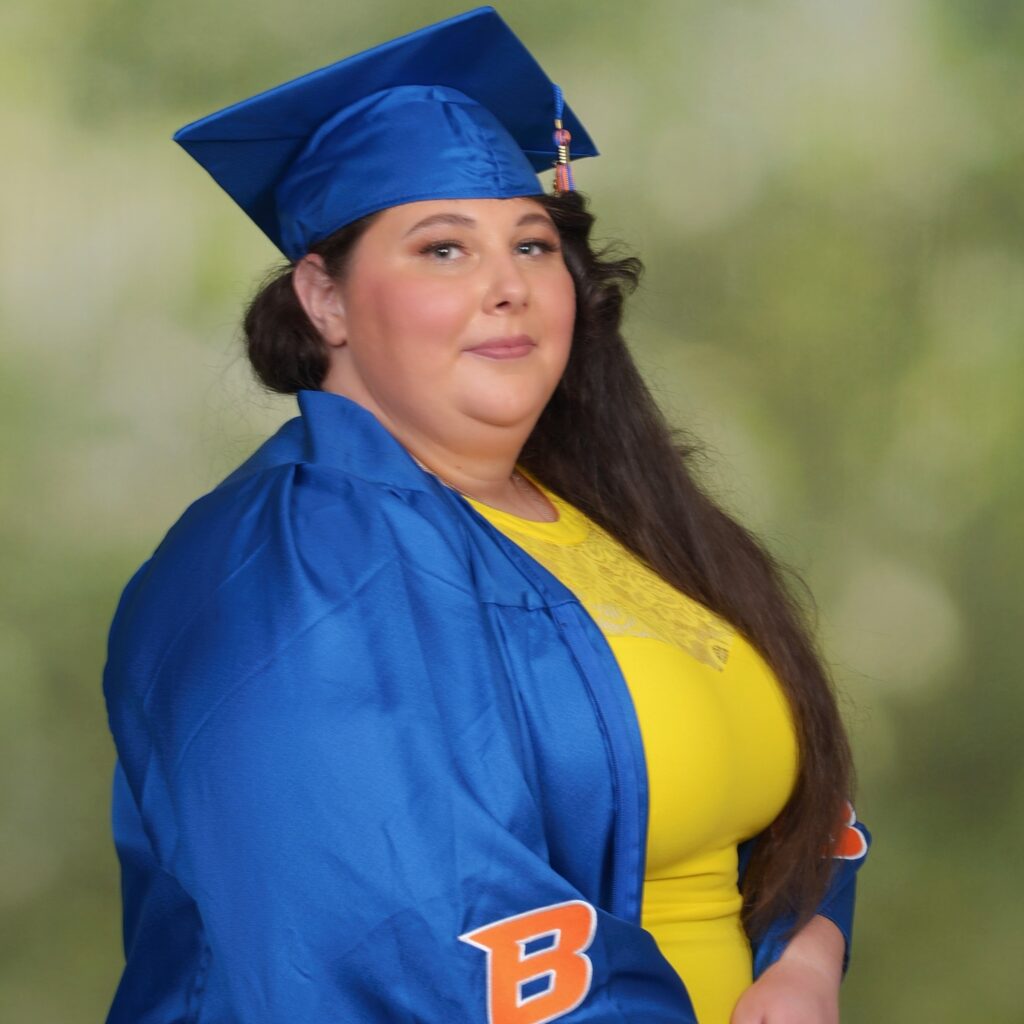 Alyssa Koslowski in a graduation cap and gown.