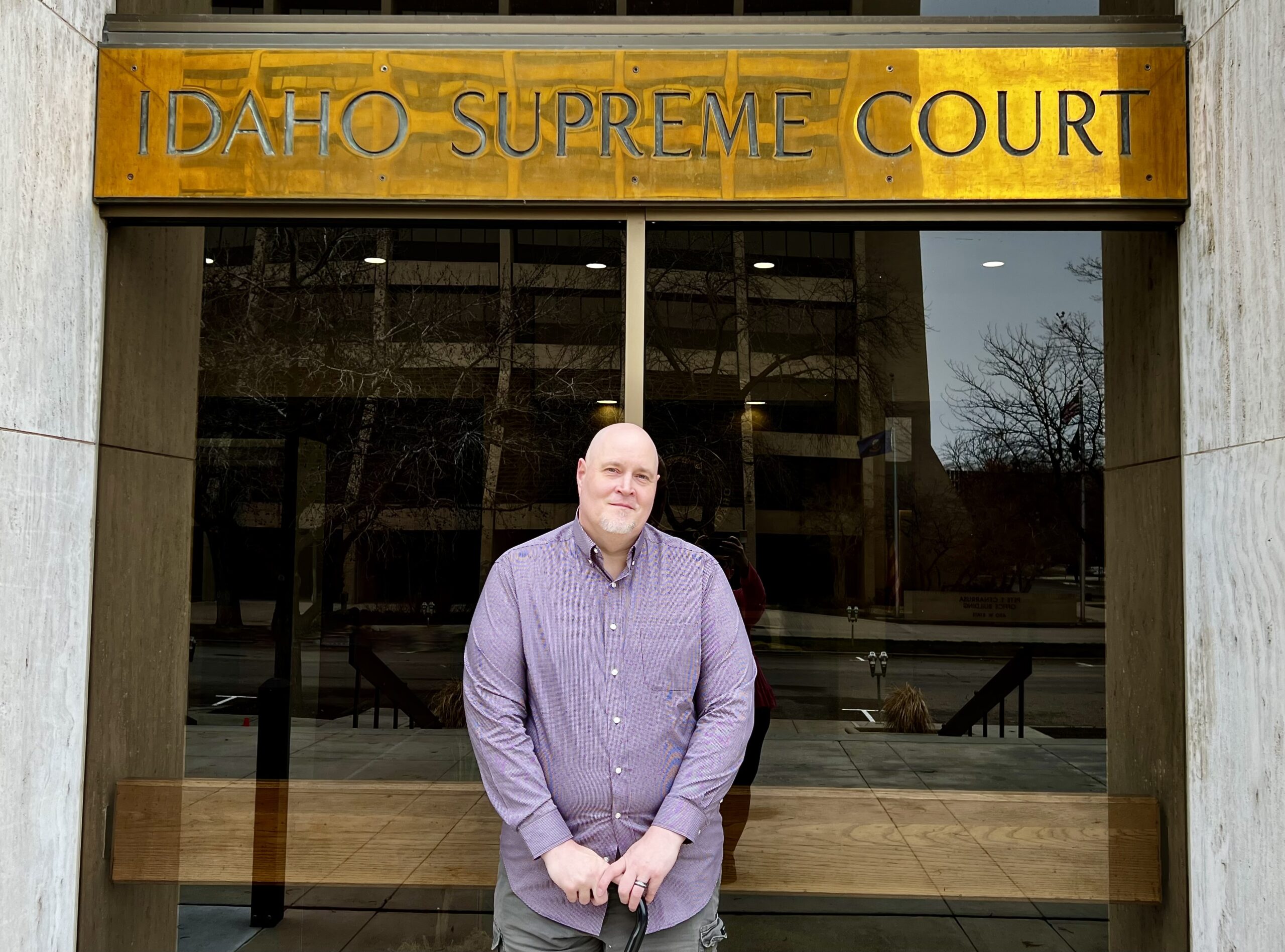 Paul Tucker stands in front of the Idaho Supreme Court building. 