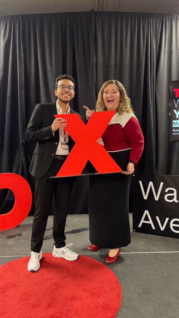 Youssef Ben Ameur standing with an X from TEDx