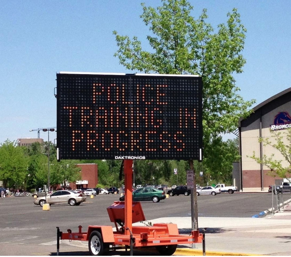 Street sign indicating 'police training in progress'