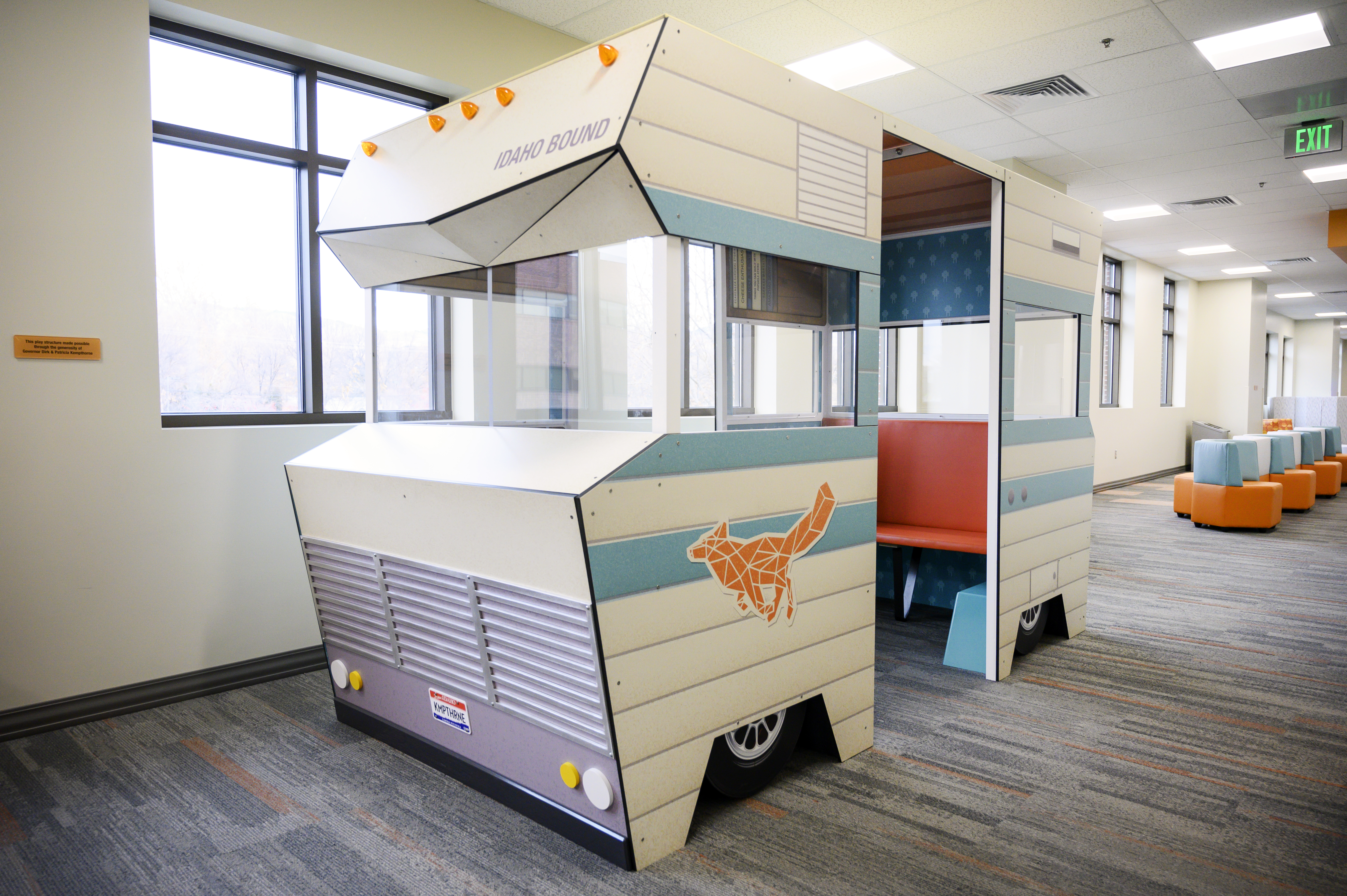 A seating area made to look like an RV, that says 