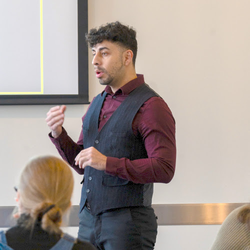 Adrian Rodriguez presents at the Boise State University 3MT Competition