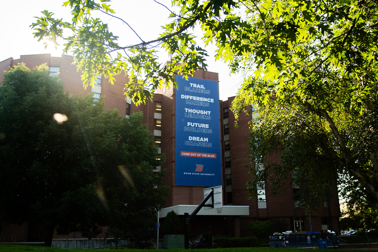 Large marketing banner on residence hall
