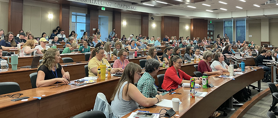 Teachers from across the region in a lecture hall at Boise State for the annual Math Teaching Conference