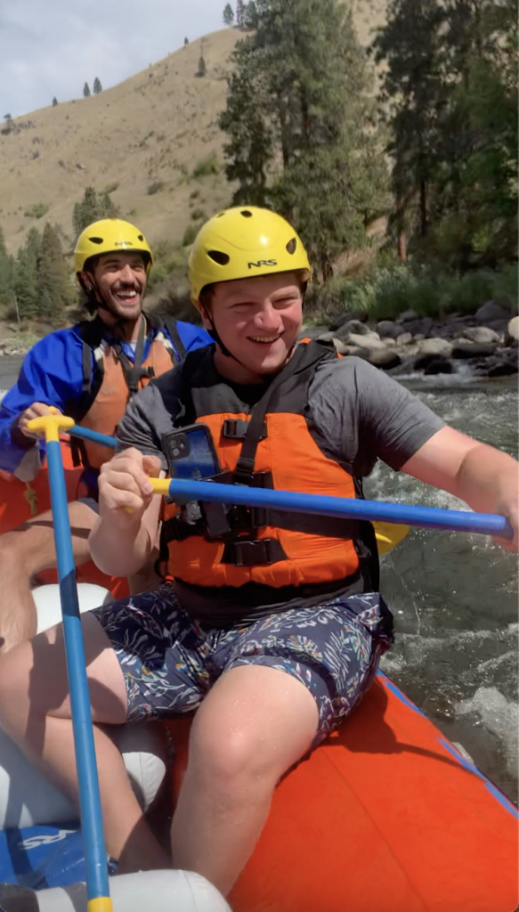 Carson smiling while rafting 