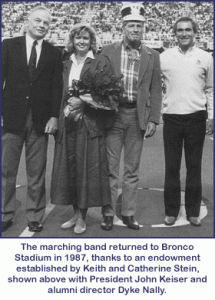The marching band returned to Bronco Stadium in 1987, thanks to an endowment established by Keith and Catherine Stein, shown with President John Keiser and alumni director Dyke Nally