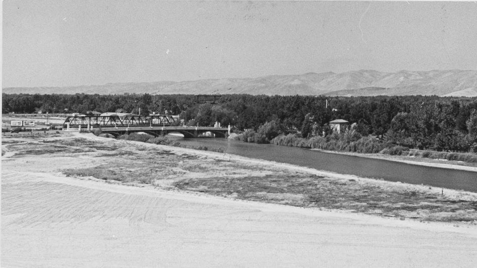 A northwest view from the tower (now the Administration Building) showing the Oregon Trail memorial bridge over the Boise River. The 8th Street steel bridge is also visible, 1940
