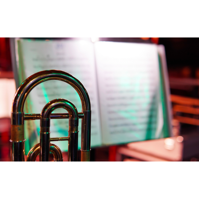 Image of a trumpet and a musical notes book
