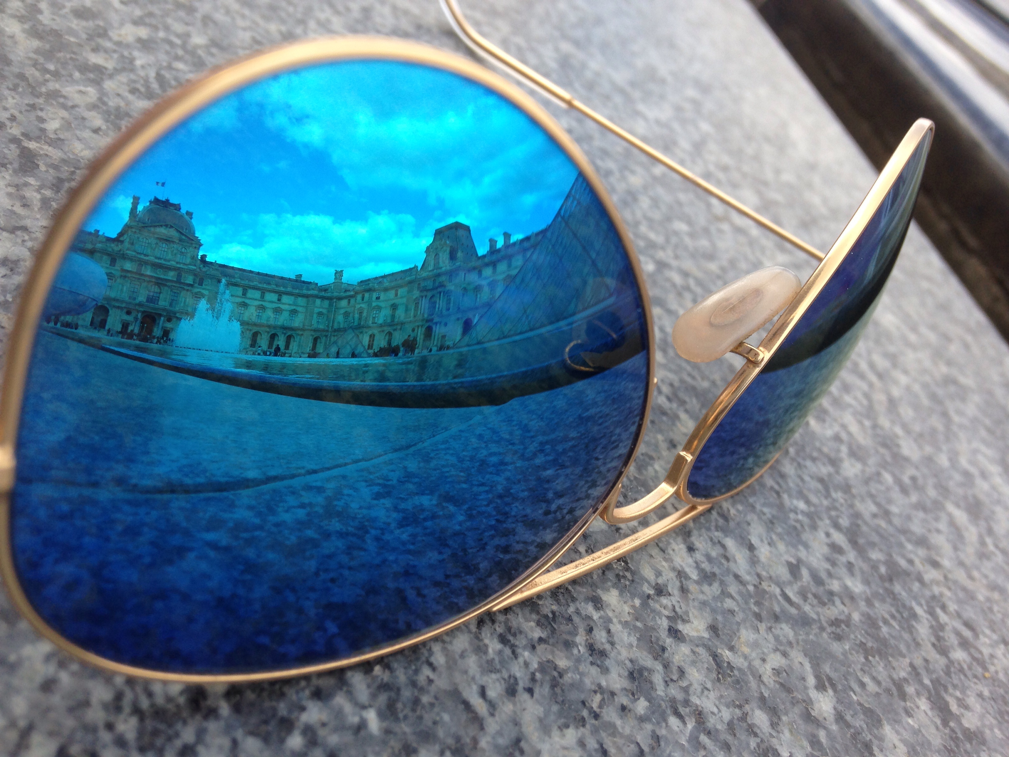 Louvre reflected in sunglasses