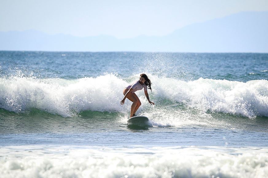 Anne Marie Jayo surfing in CostaRica