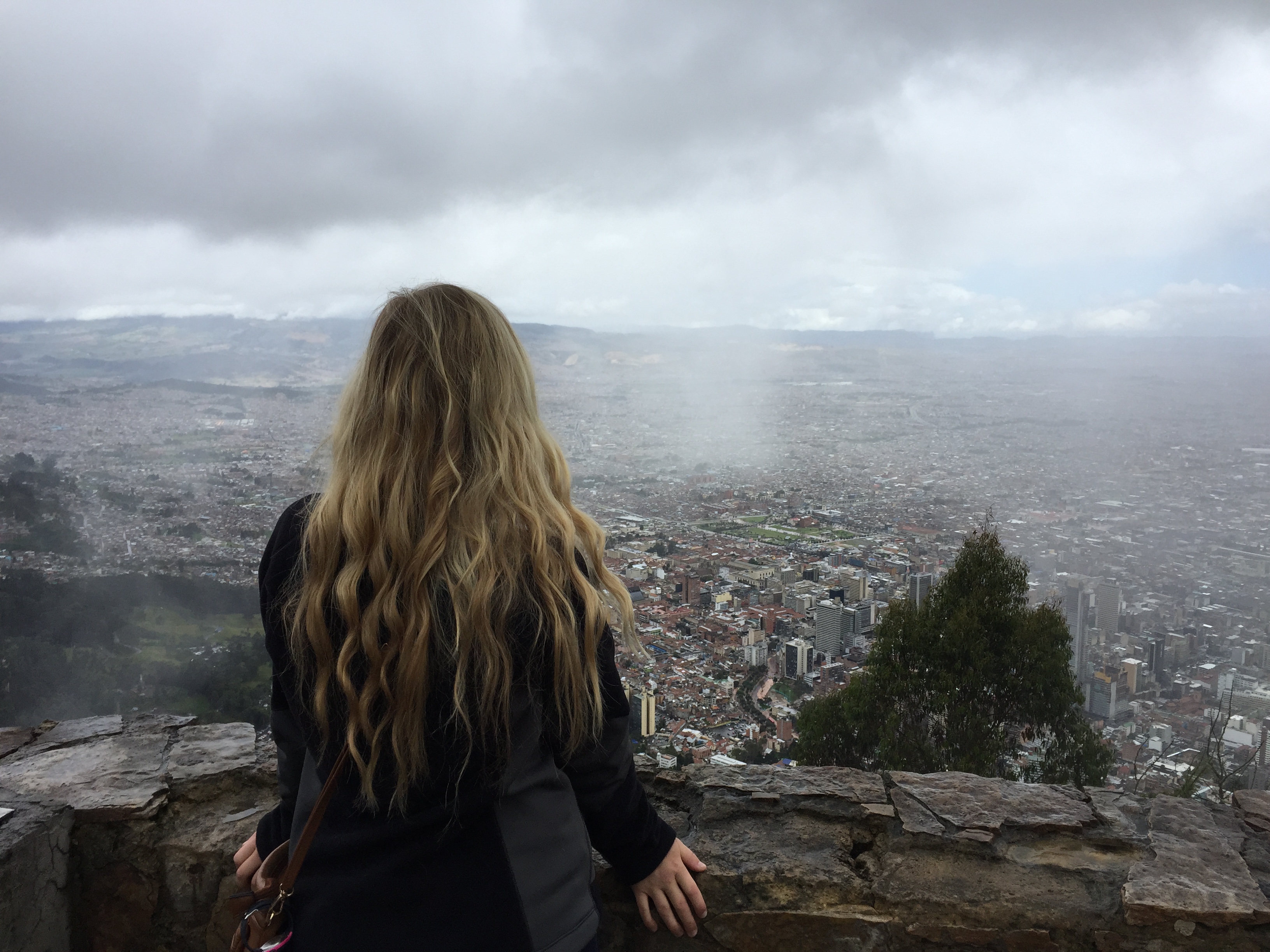 Abby Cain overlooking city of Bogotoa Colombia