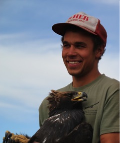 Ben Dudek holding golden eagle