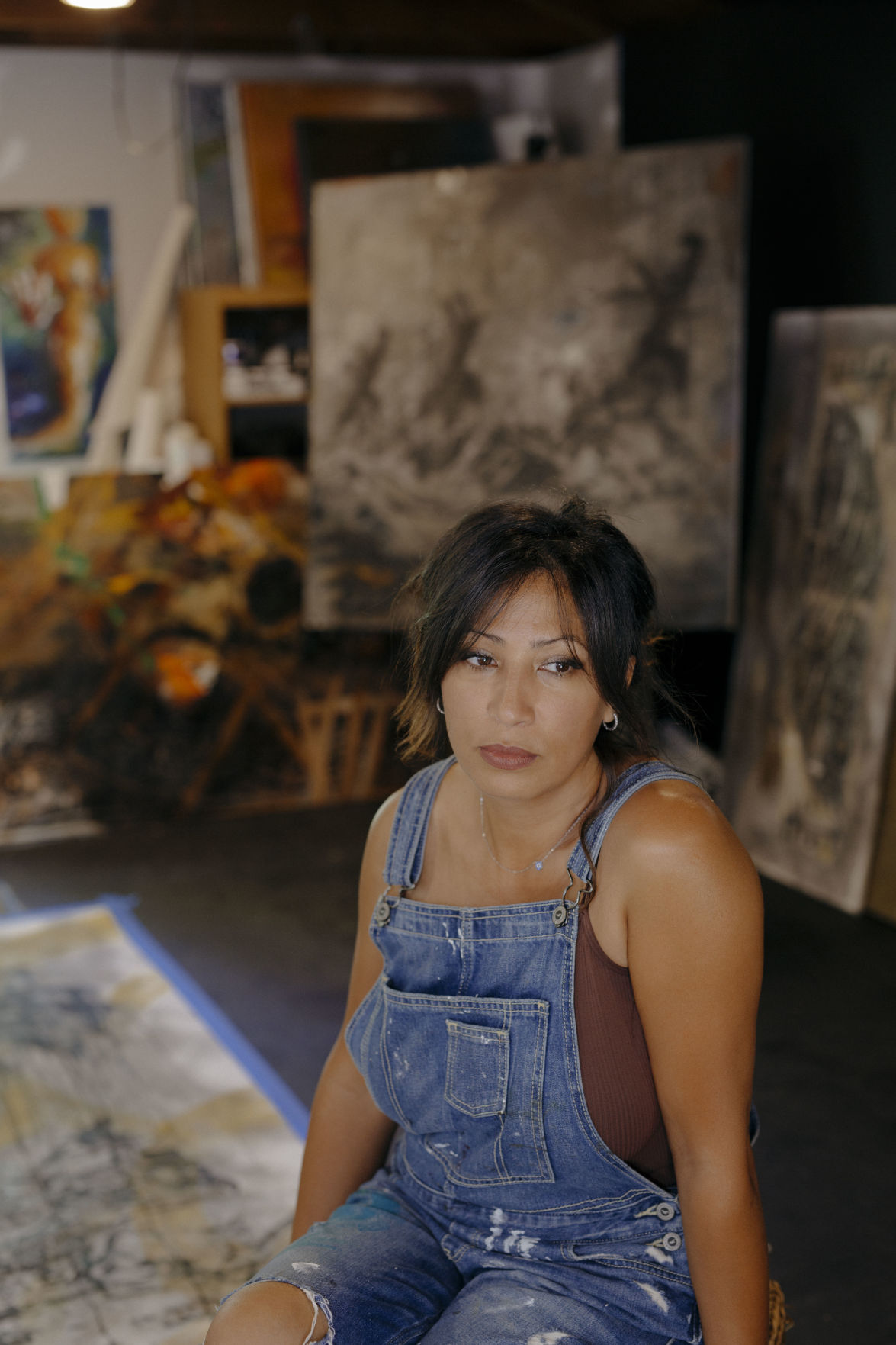 Portrait of the artist in her studio