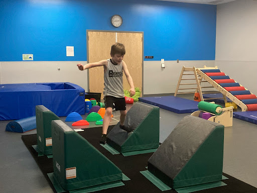 A child running through an obstacle course