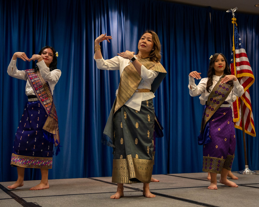 Three women present cultural dance 