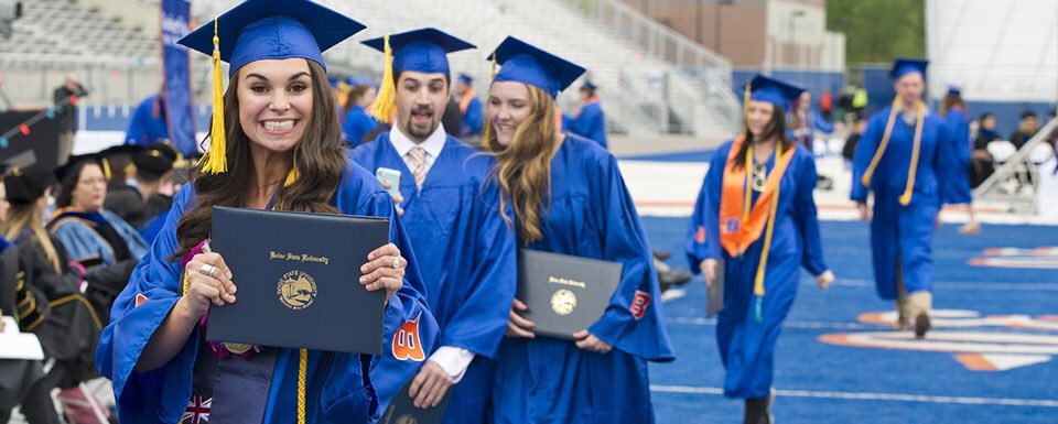 Spring commencement on blue turf