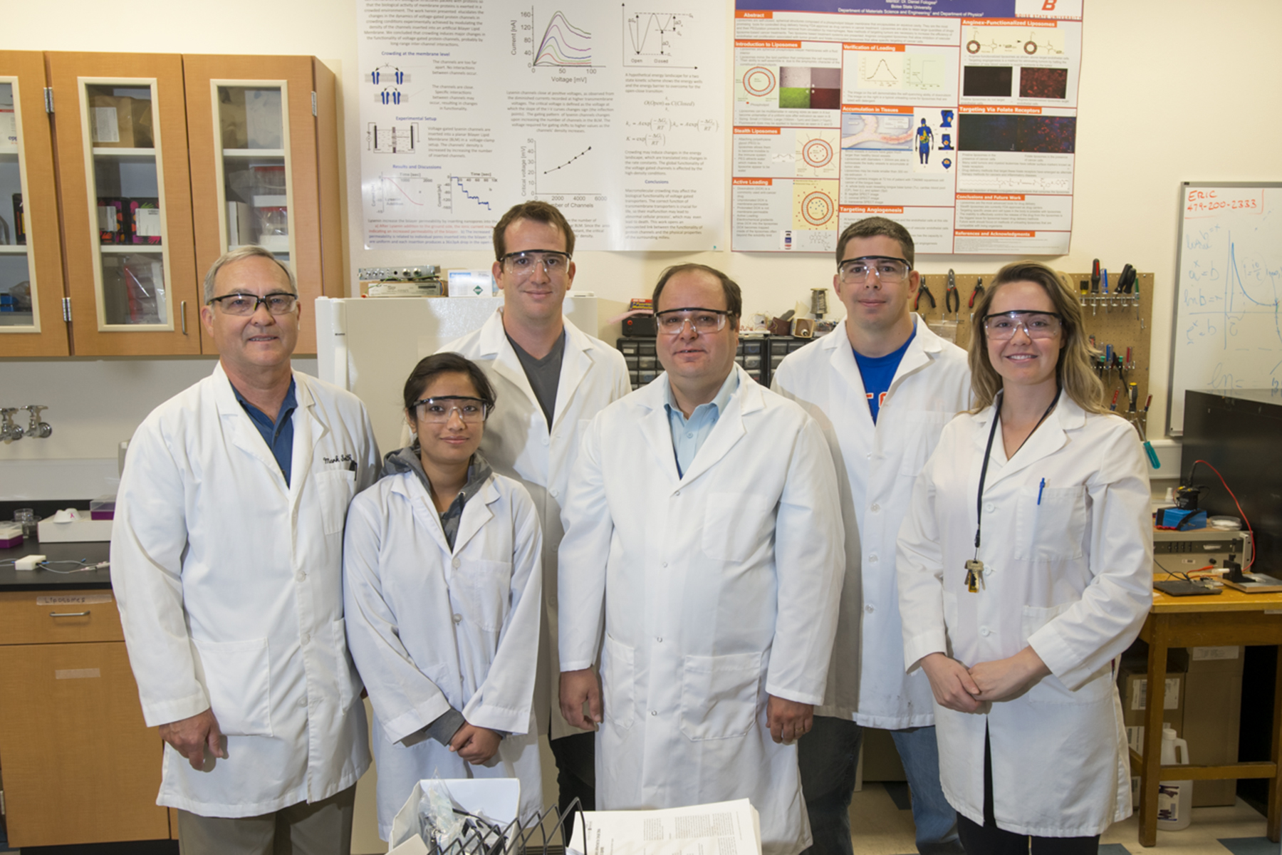 Daniel Folgea and colleagues in the lab 
