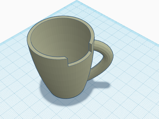Mug with missing space where transparent cube was placed