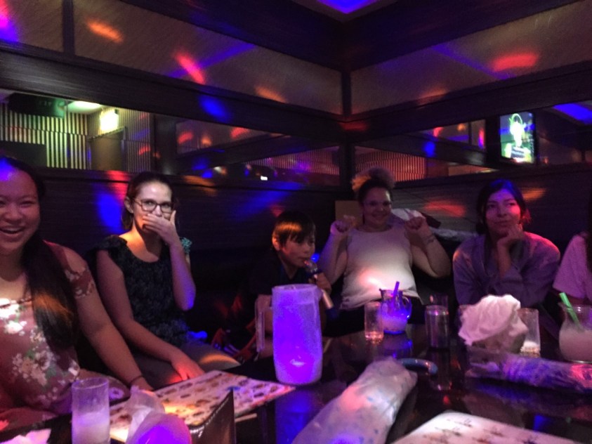 group doing karaoke
