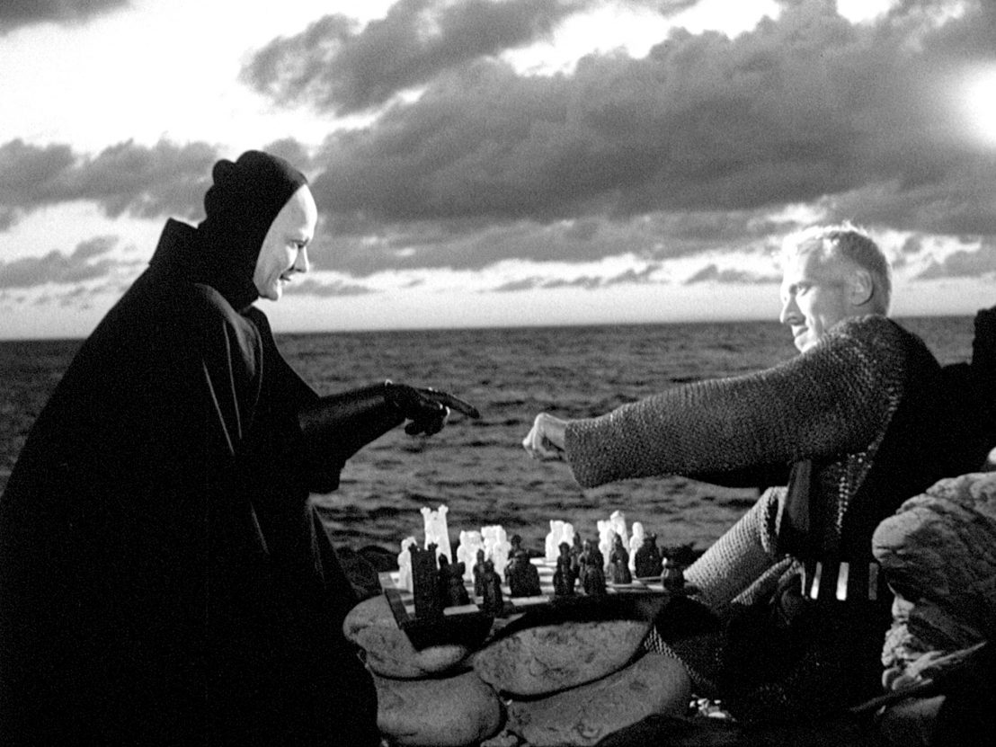 death playing chess with man, photo