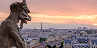 Photo of Notre Dame gargoyle and Paris