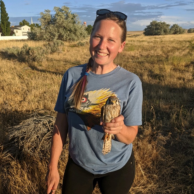 Raptor Biology student Jessica Taylor holding American Kestrel female in Utah