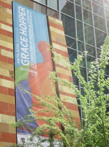 banner on tall building for grace hopper conference