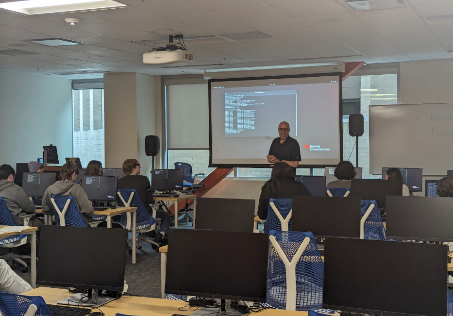 Image of the high school students about cyber security in Boise State's computer lab.