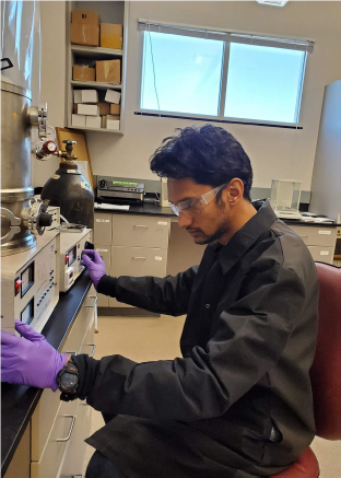 ECE PhD student Al-Amin Ahmed Simon working in the Nanoionic Devices and Materials Lab