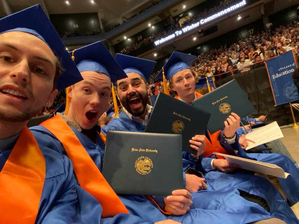 ME students pose with their diploma covers at Winter Commencement 2019