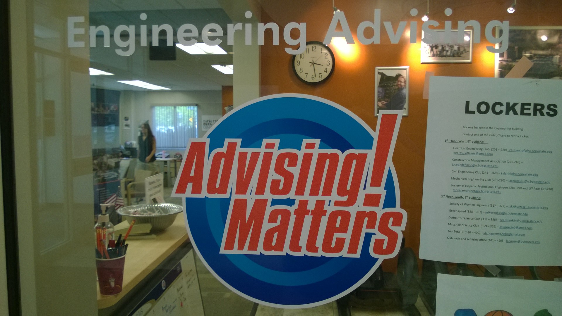 glass window of COEN Advising office with 'Engineering Matters!" decal