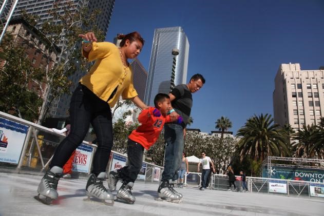people skating on an outdoor rink