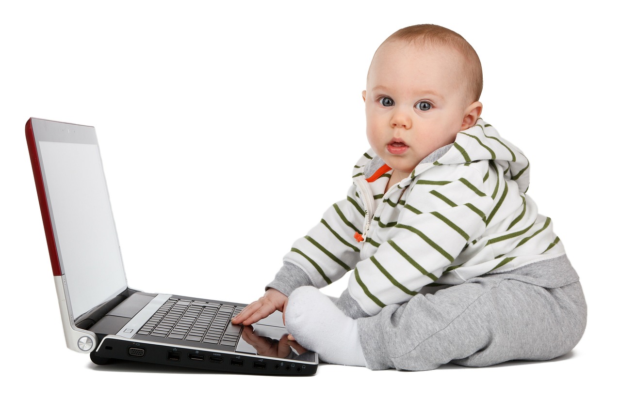 infant at a laptop