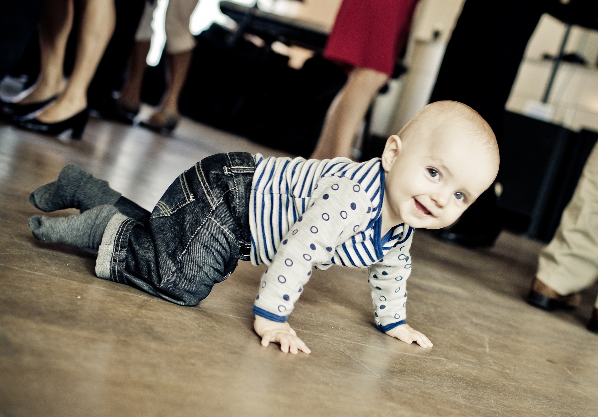 baby crawling on a floor