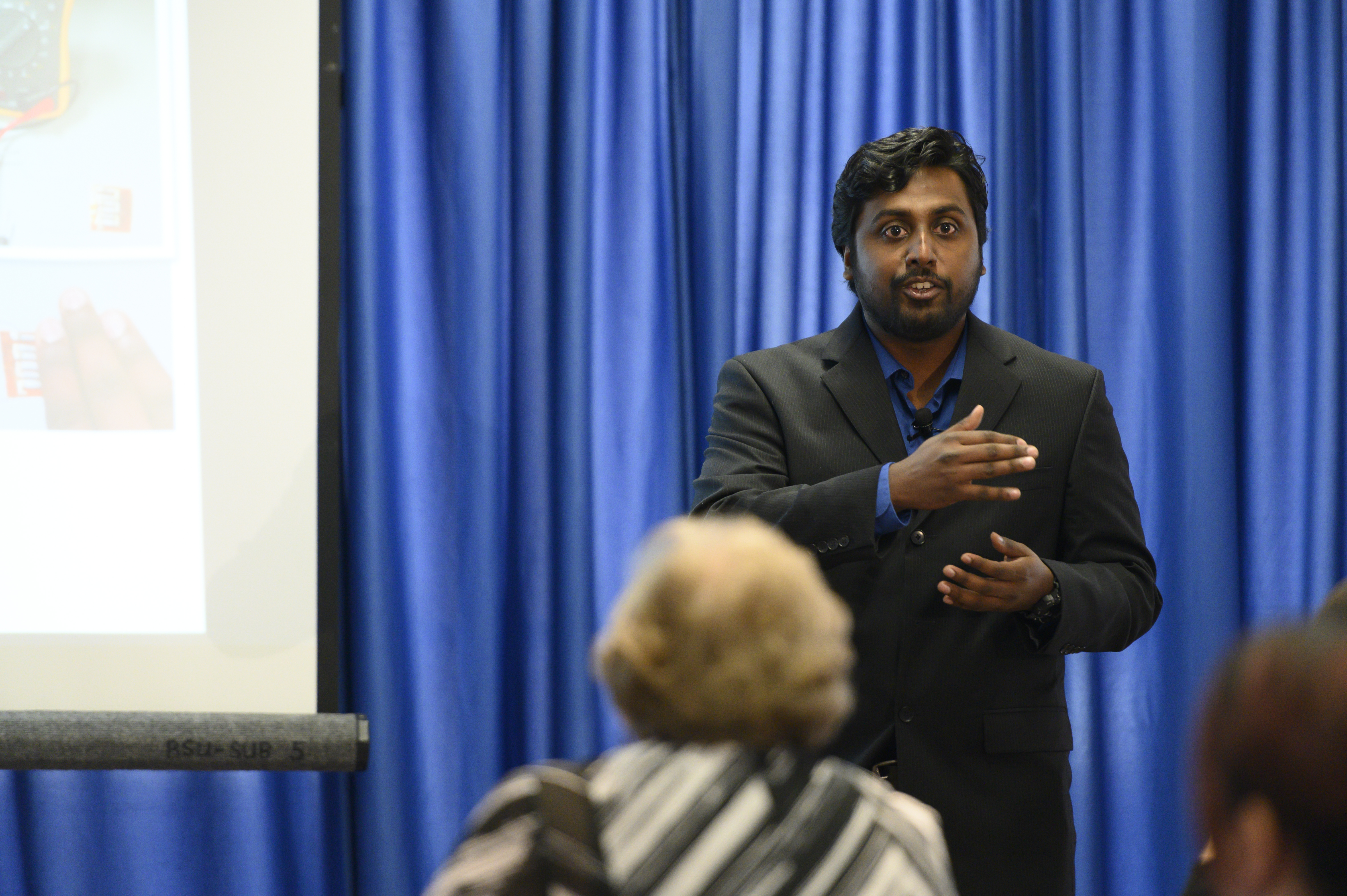 photo of Tony Varghese presenting