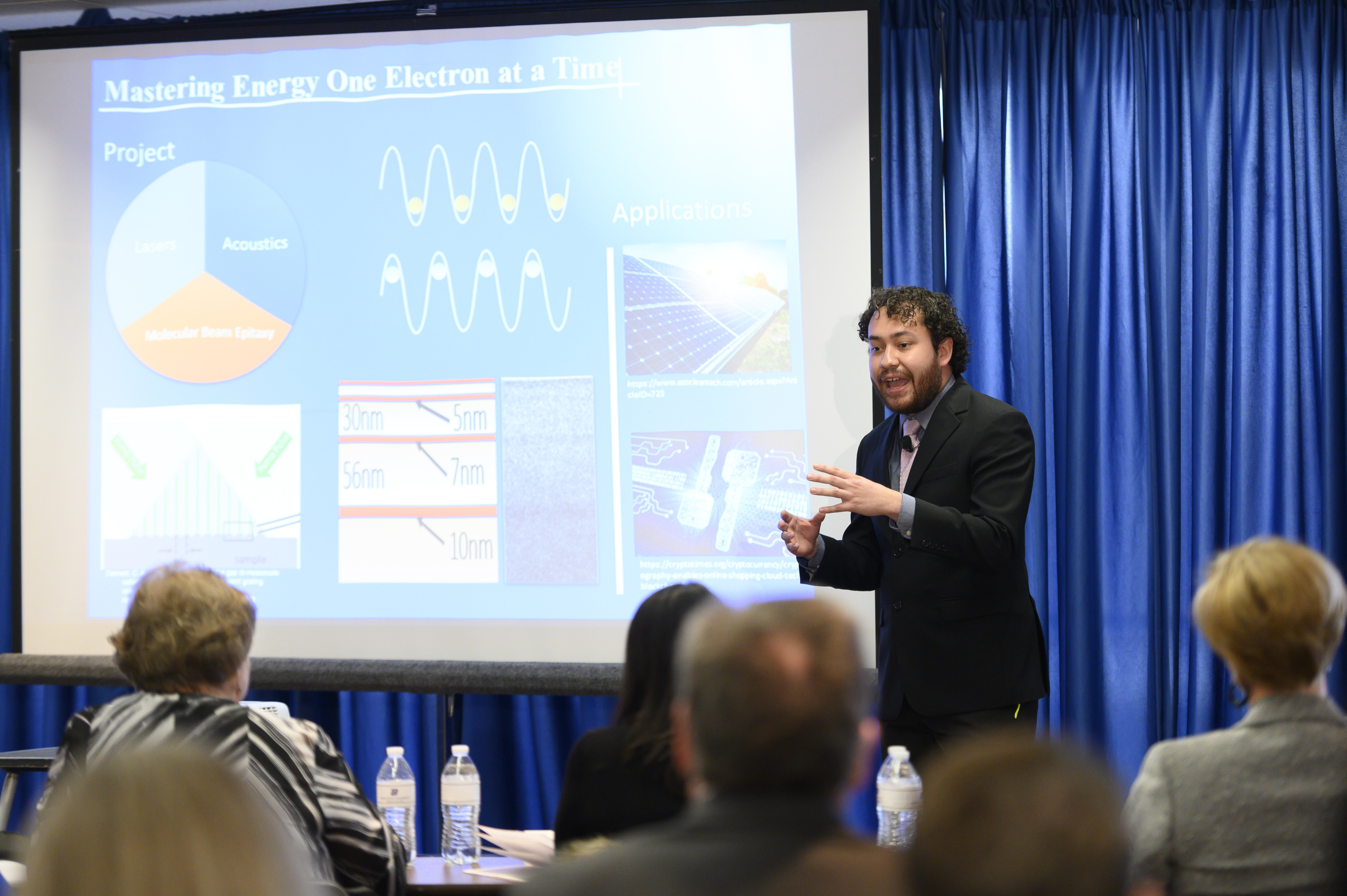 photo of Kevin Vallejo presenting at the 3MT