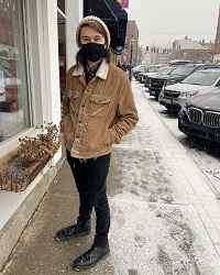 Adam Ray Wagner standing on a snowy sidewalk