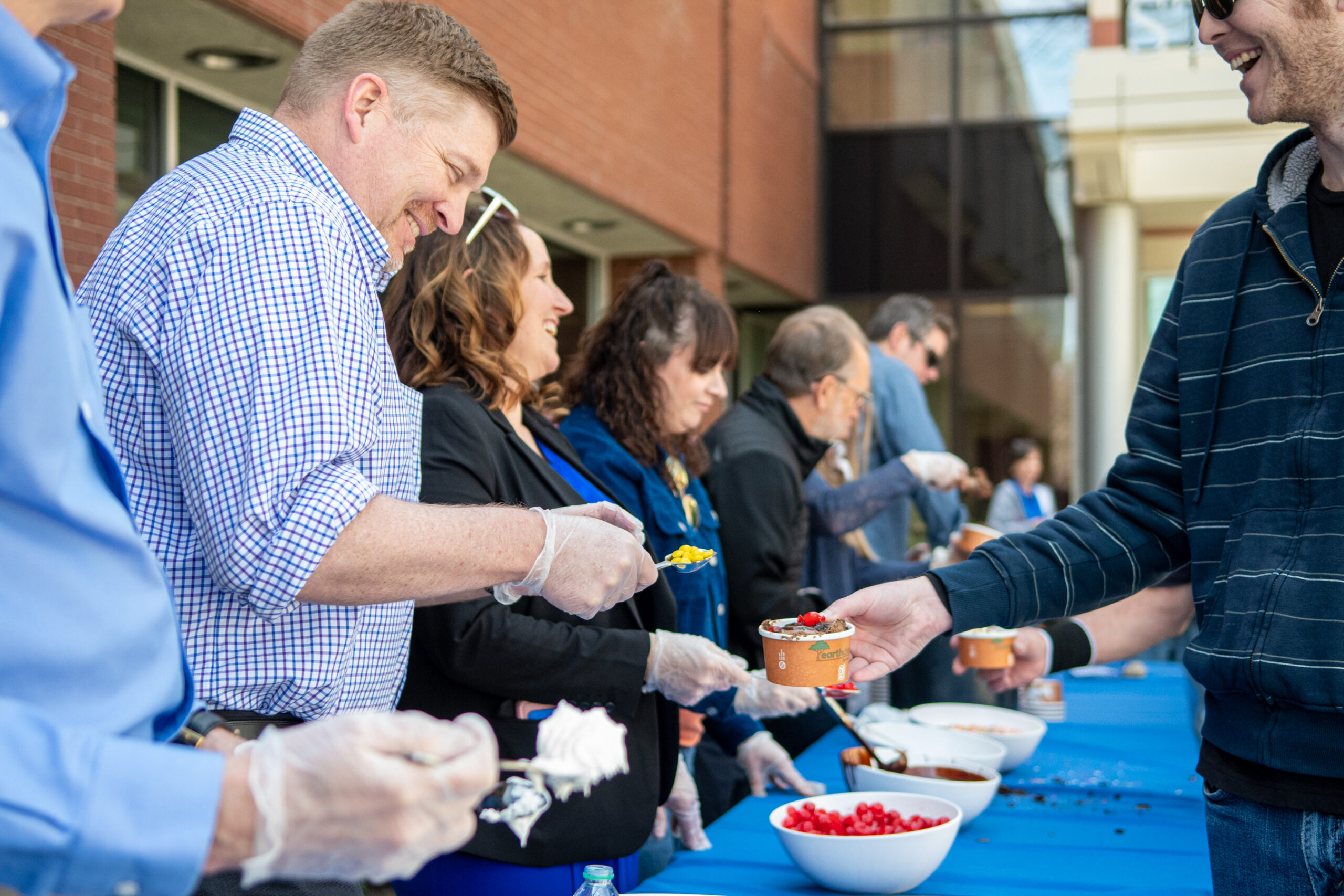 Leadership serving ice cream at Employee Appreciation Week