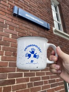 A mug with the anthropology department logo.