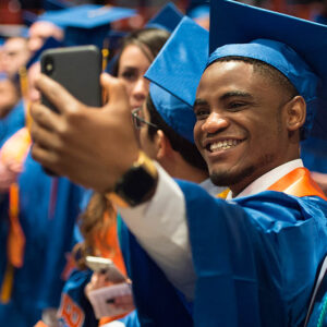 Boise State Graduate taking selfie on camera phone