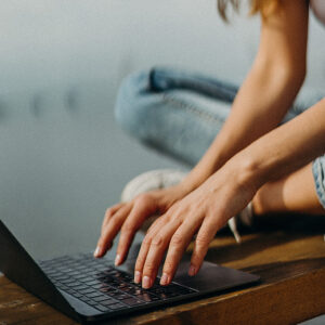 Stock photo of hands typing on computer