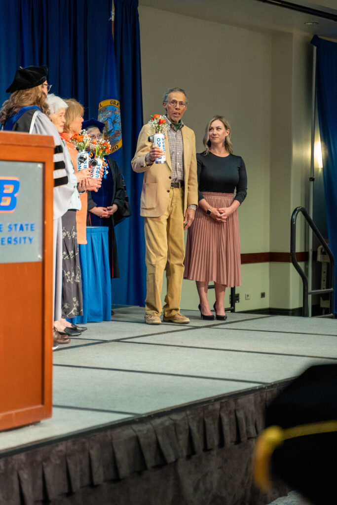 Honoree Bill “Action” Jackson addresses the graduates after being recognized for the John William Jackson Fund’s financial support of the Boise State School of Nursing